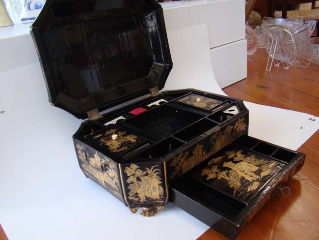 A fine large 19th century Chinese black and gold lacquer sewing box loaded with the original period accessories — image 4